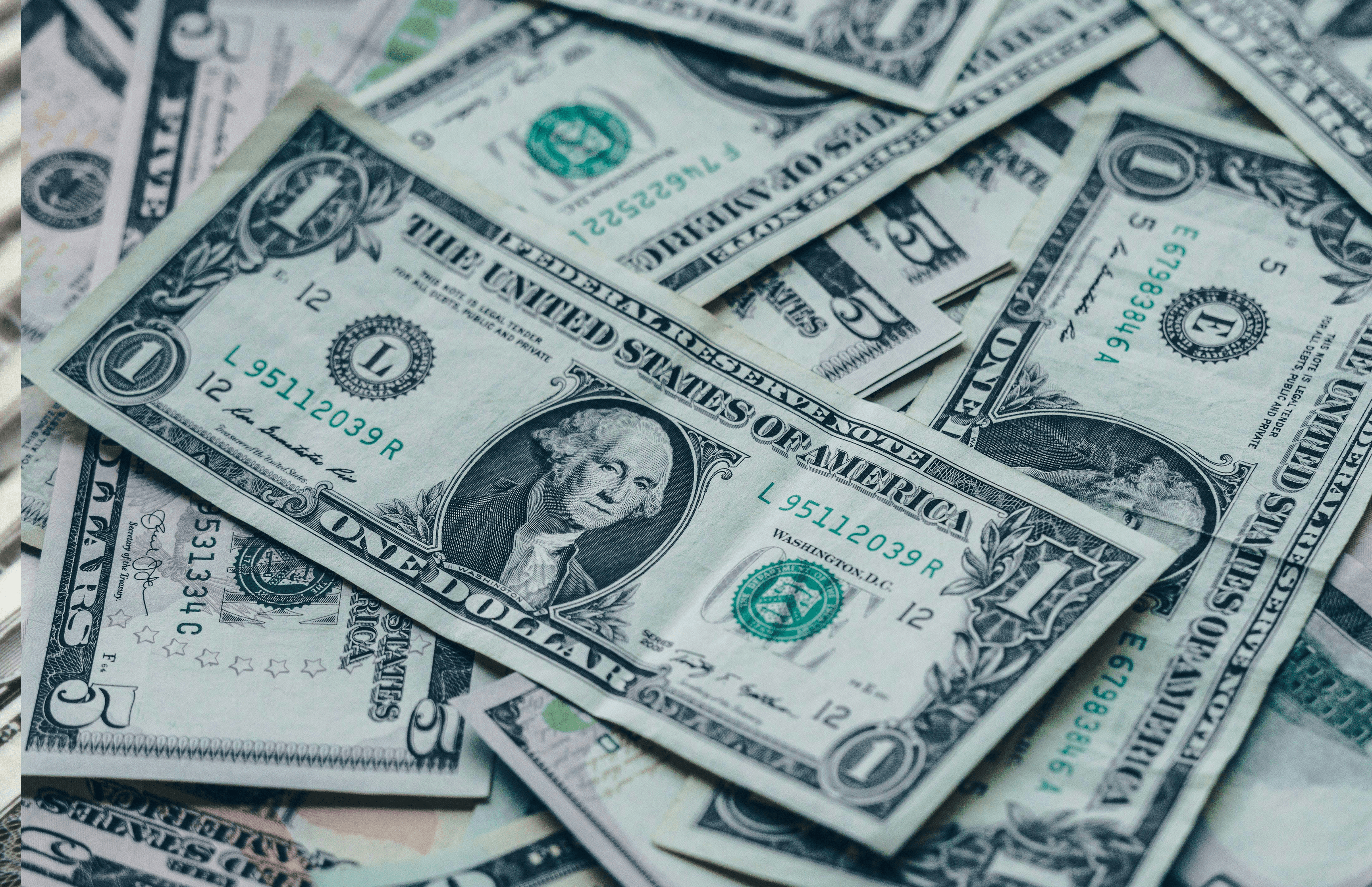 Real Estate Loans - JGL CAPITAL | Dollar bills loose Currency